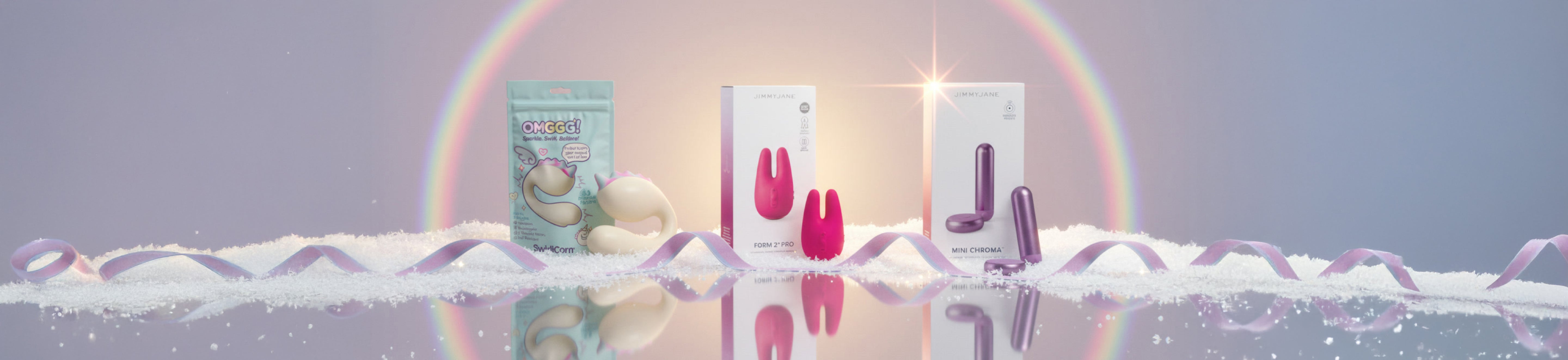 Candle with a rainbow and decorative elements on a reflective surface