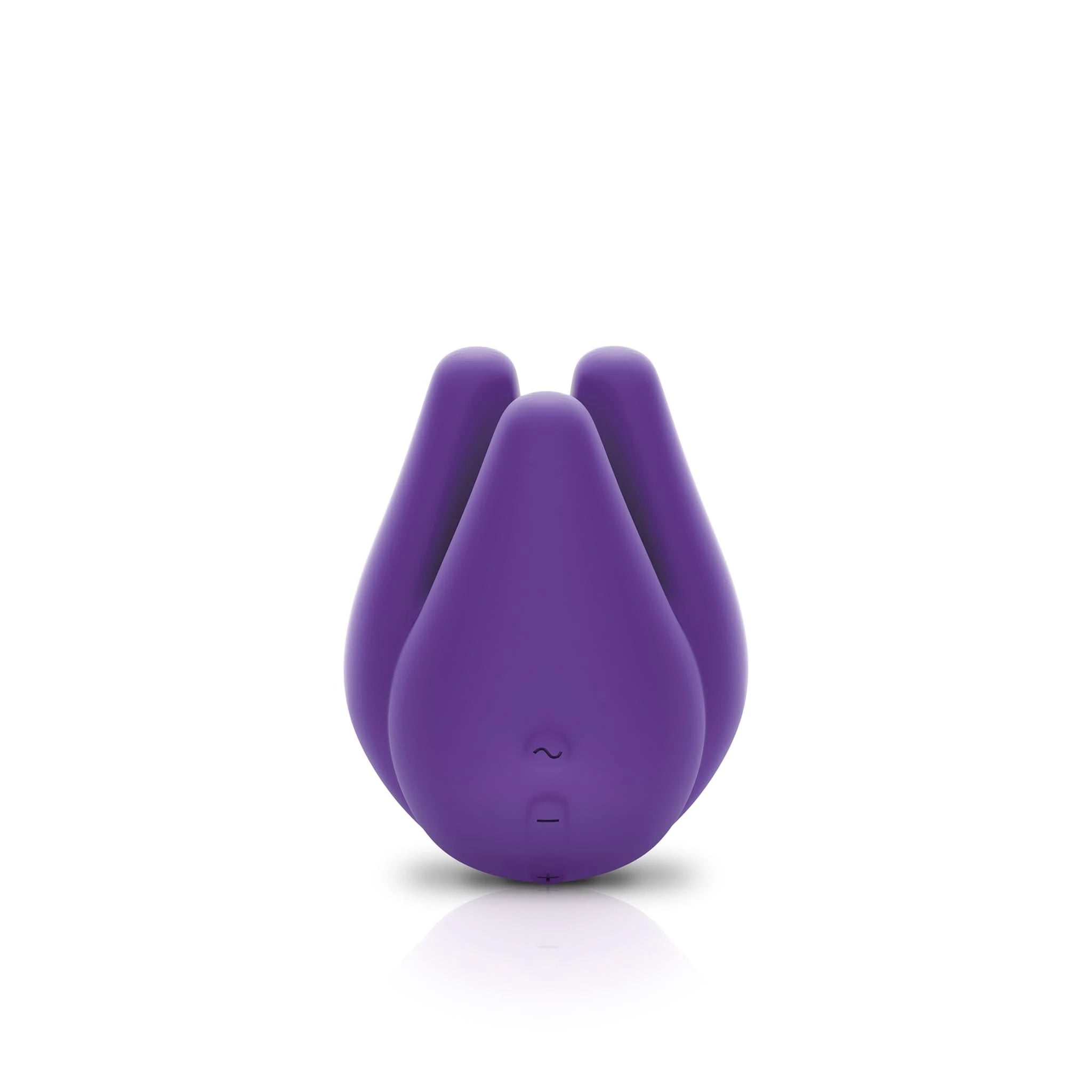 A purple, flower-shaped silicone Love Pods™ Tre Clitoral Vibrator from JIMMYJANE®, included in the Pure UV Adult Toys Sanitizer and Vibrator Bundle, displayed against a white background.