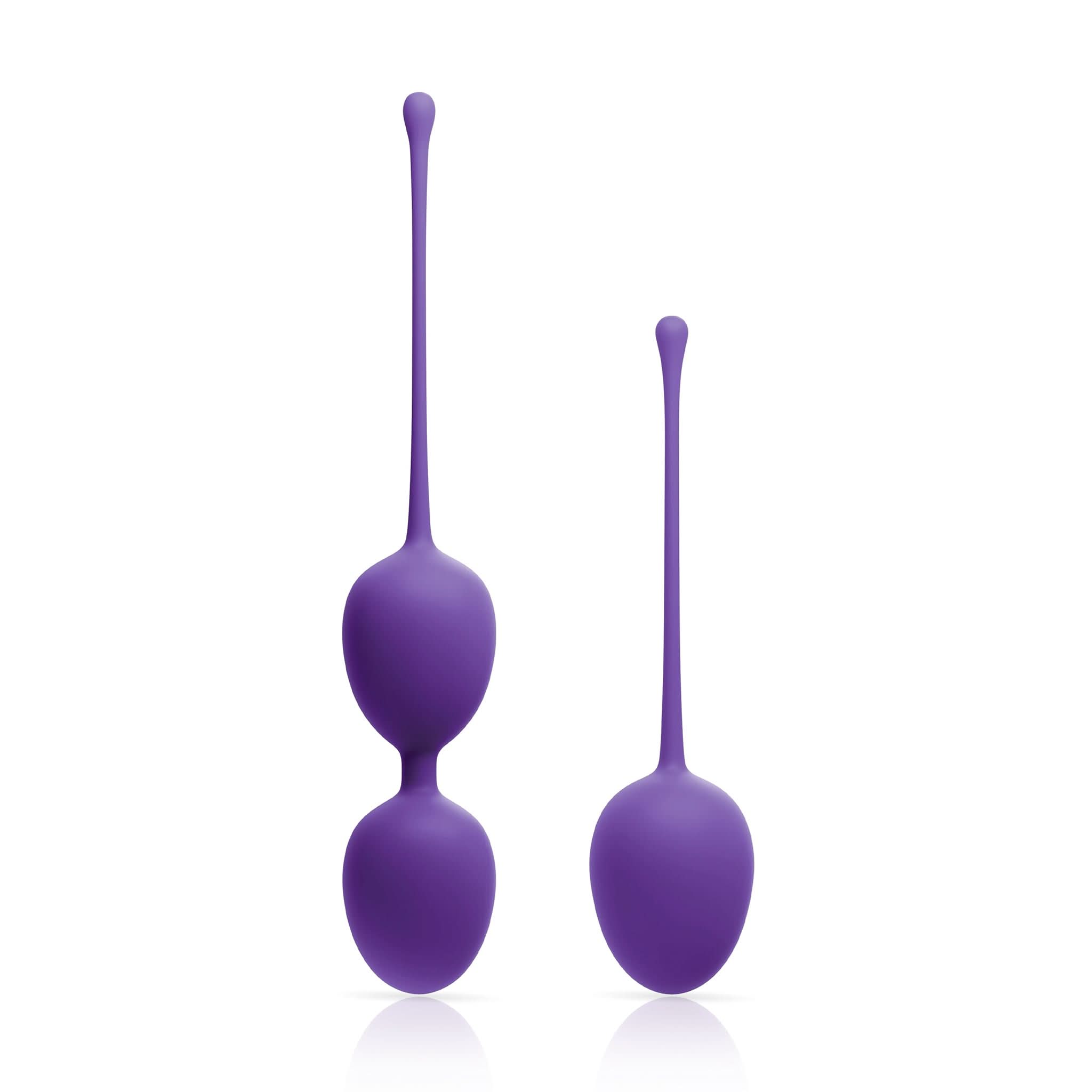 The JIMMYJANE® Purple Intimate Care Kegel Trainer Set features two silicone Kegel balls, one single and one double, each with a long stem, shown on a white background.