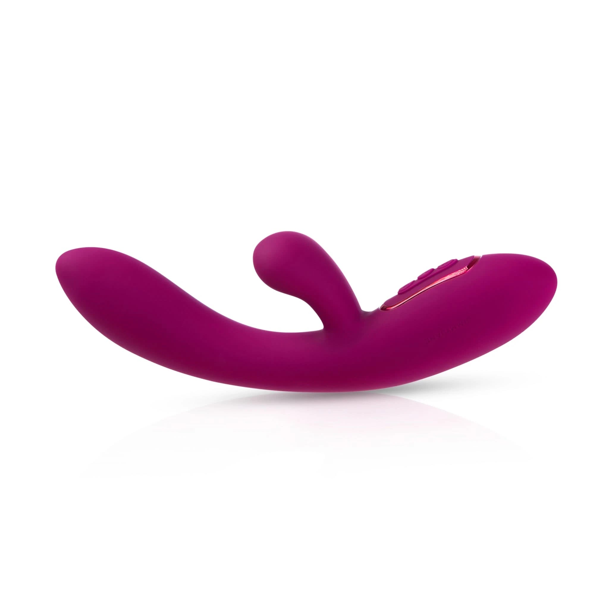 The JIMMYJANE® Solis™ is a purple, curved silicone Rabbit vibrator with a smaller extension and base control buttons. Shown on white, it delivers stereophonic vibrations for an enhanced experience.