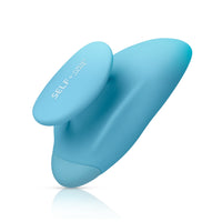 Self + Jimmyjane vibrating massager with finger grip in light blue 3/4 view