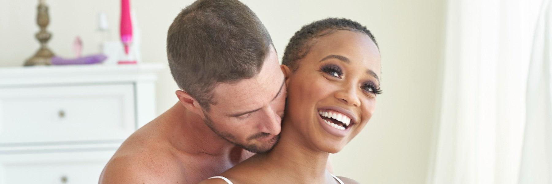 Happy couple embracing in bright bedroom, luxury romance setting, JIMMYJANE premium lifestyle