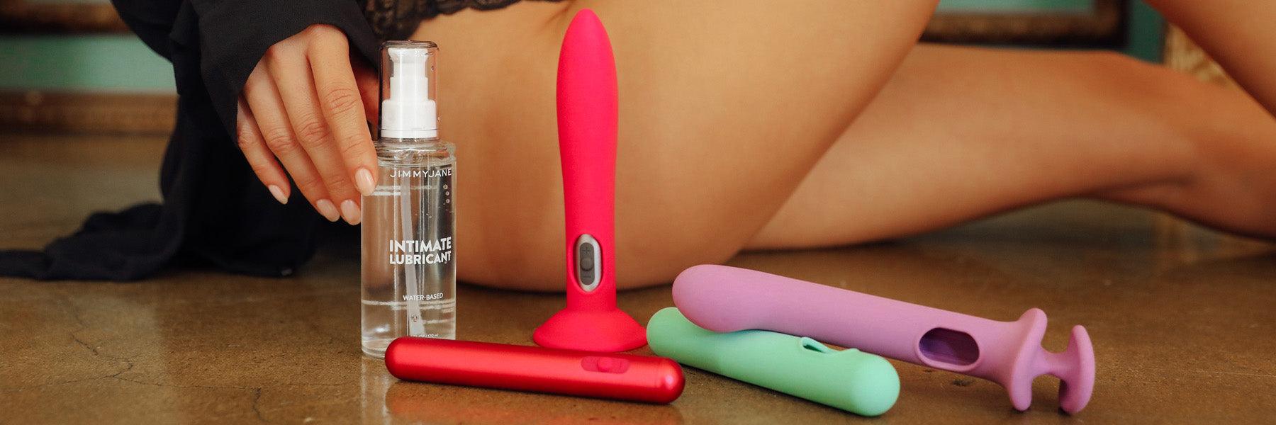 Luxury JIMMYJANE intimate lubricant and colorful adult wellness products on floor