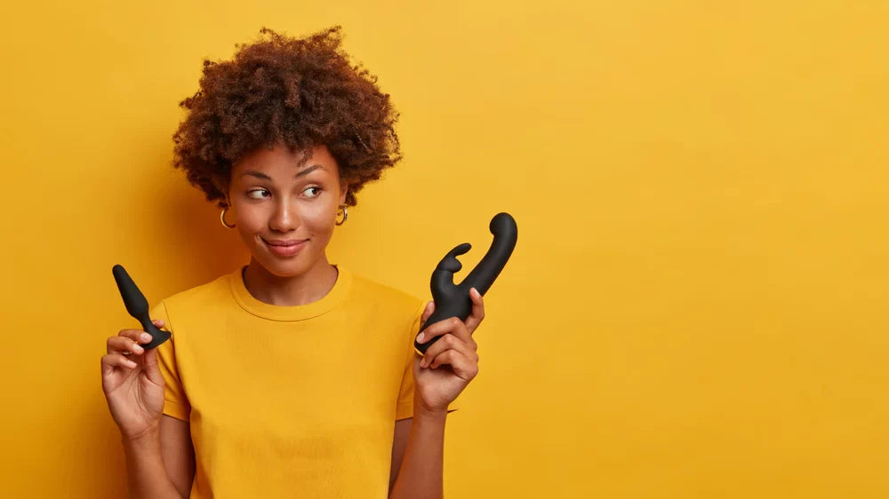Woman holding a rabbit vibrator