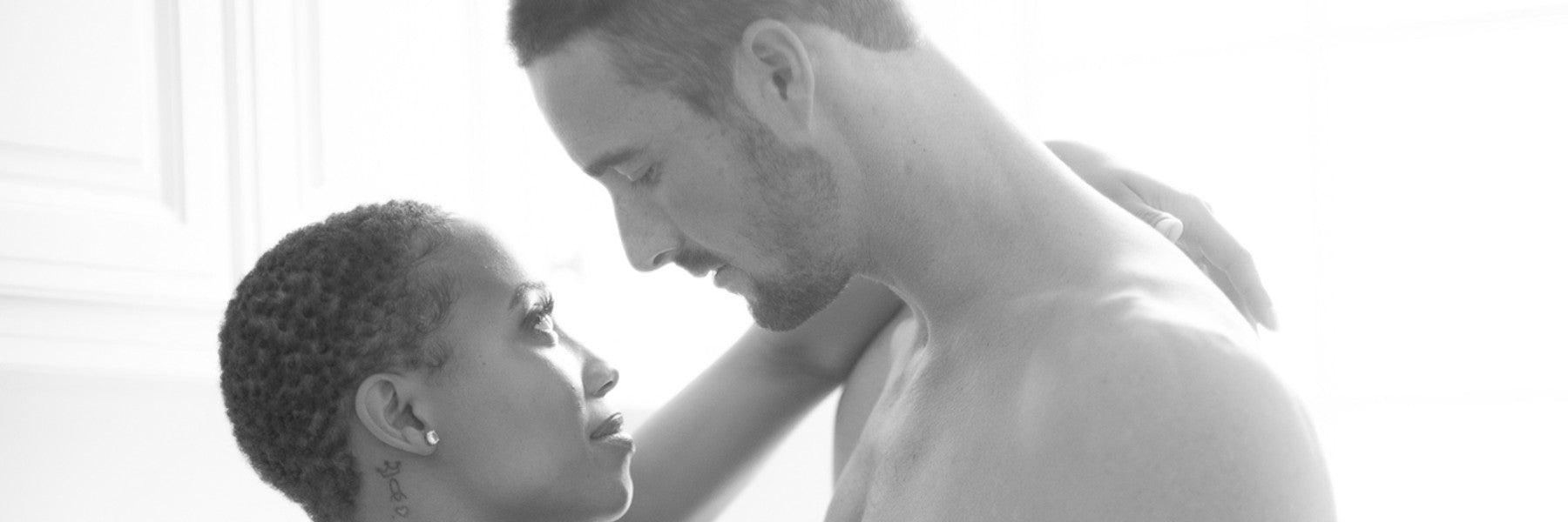 Romantic couple embracing in soft daylight, luxury intimacy theme for JIMMYJANE homepage.