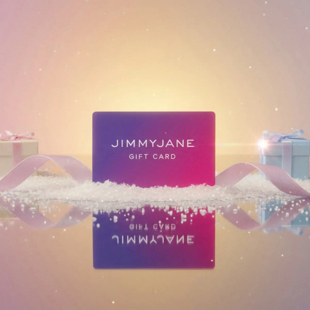 JIMMYJANE gift card with holiday gift boxes and ribbon on a festive, sparkling background