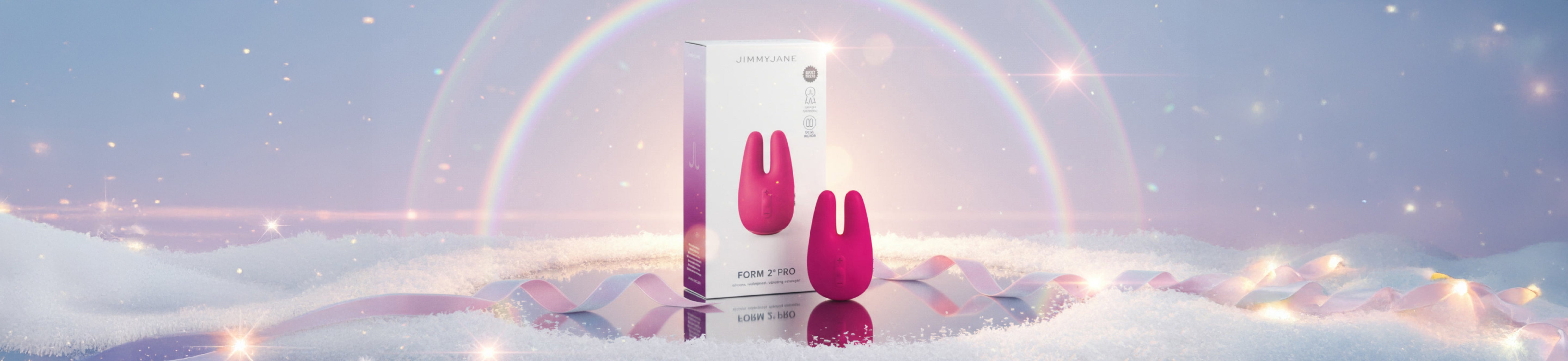 Two pink products on a reflective surface with a blurred background