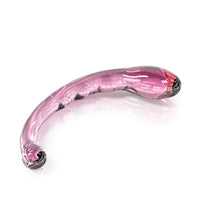 Top view angled side-facing curved borosilicate glass dildo with ribbed texture pink