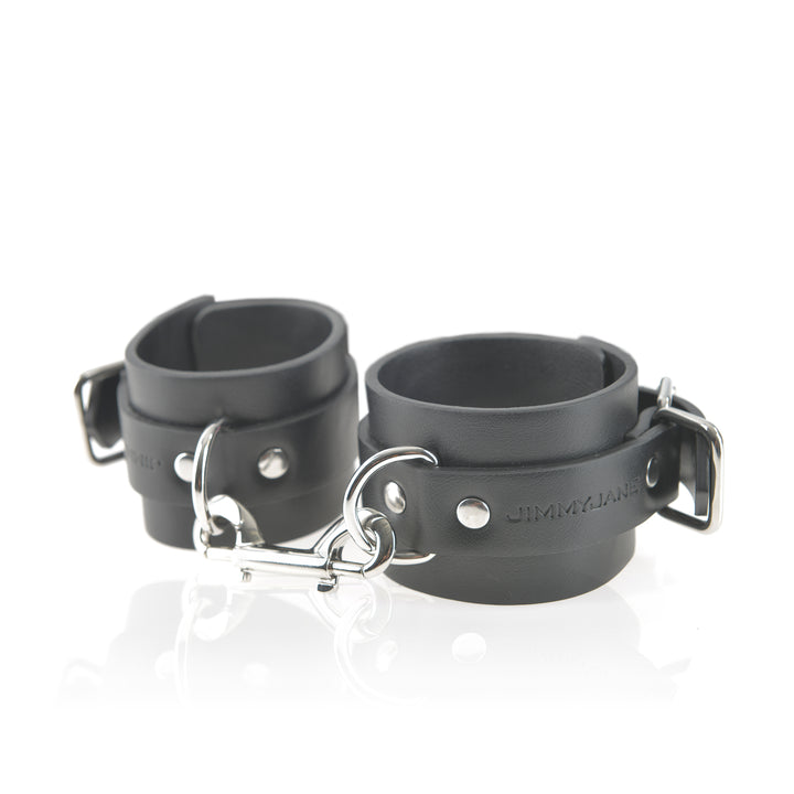 Front facing angled vegan leather wrist cuffs black