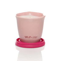 Self + Jimmyjane Seaside Neroli scented massage oil candle with burgundy base Front facing view