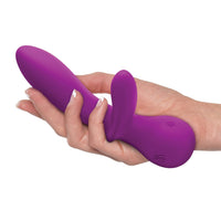 Front-facing rabbit vibrator violet in white women's hand